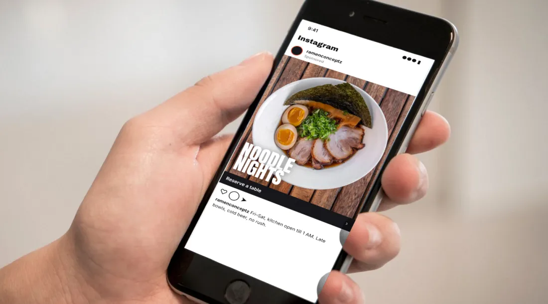 Phone showing a Noodle Nights sponsored post