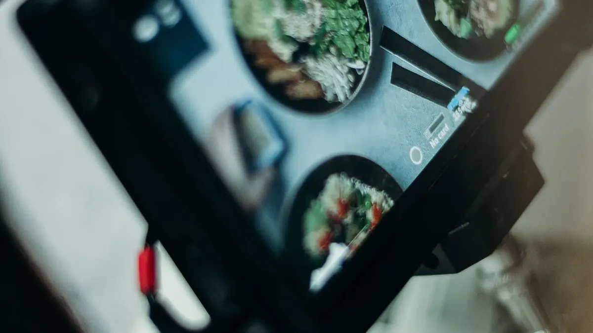 A camera screen framing dishes during a restaurant's own photo shoot